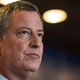 New York City Mayor Bill de Blasio speaks at a press conference after witnessing police being retrained with new guidelines at the Police Academy on Dec. 4, 2014, in the College Point neighborhood of New York City’s Queens borough.
Andrew Burton/Getty Images